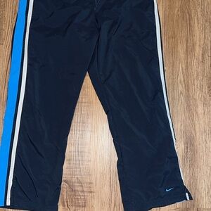 Nike Kids Black Track Pants with Blue Stripe